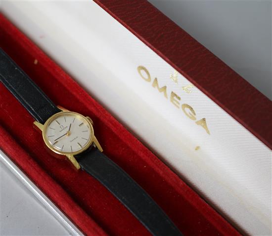 A ladys 18ct gold Omega manual wind wrist watch, with Omega box